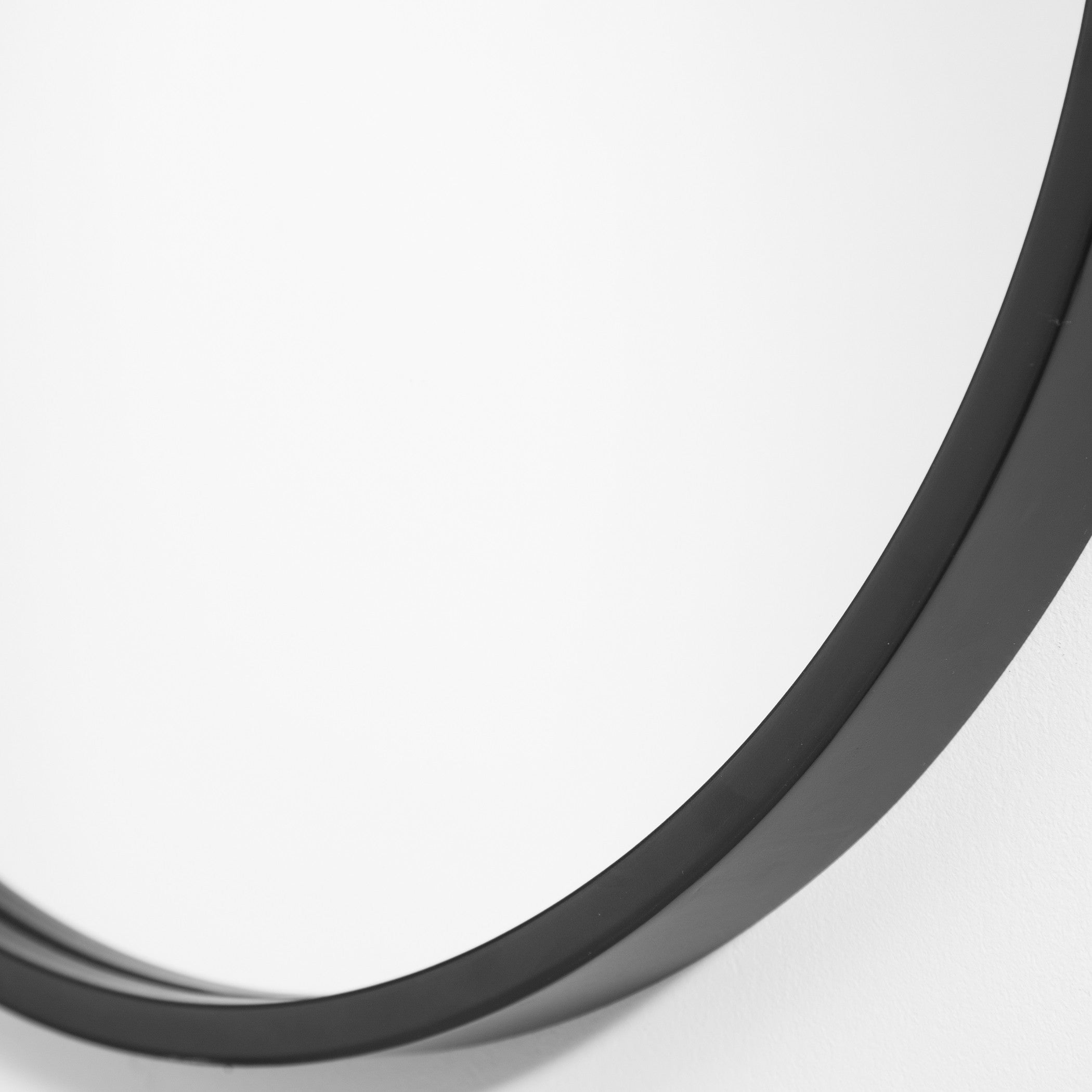 Varina Minimalist Black Oval Mirror by Uttermost