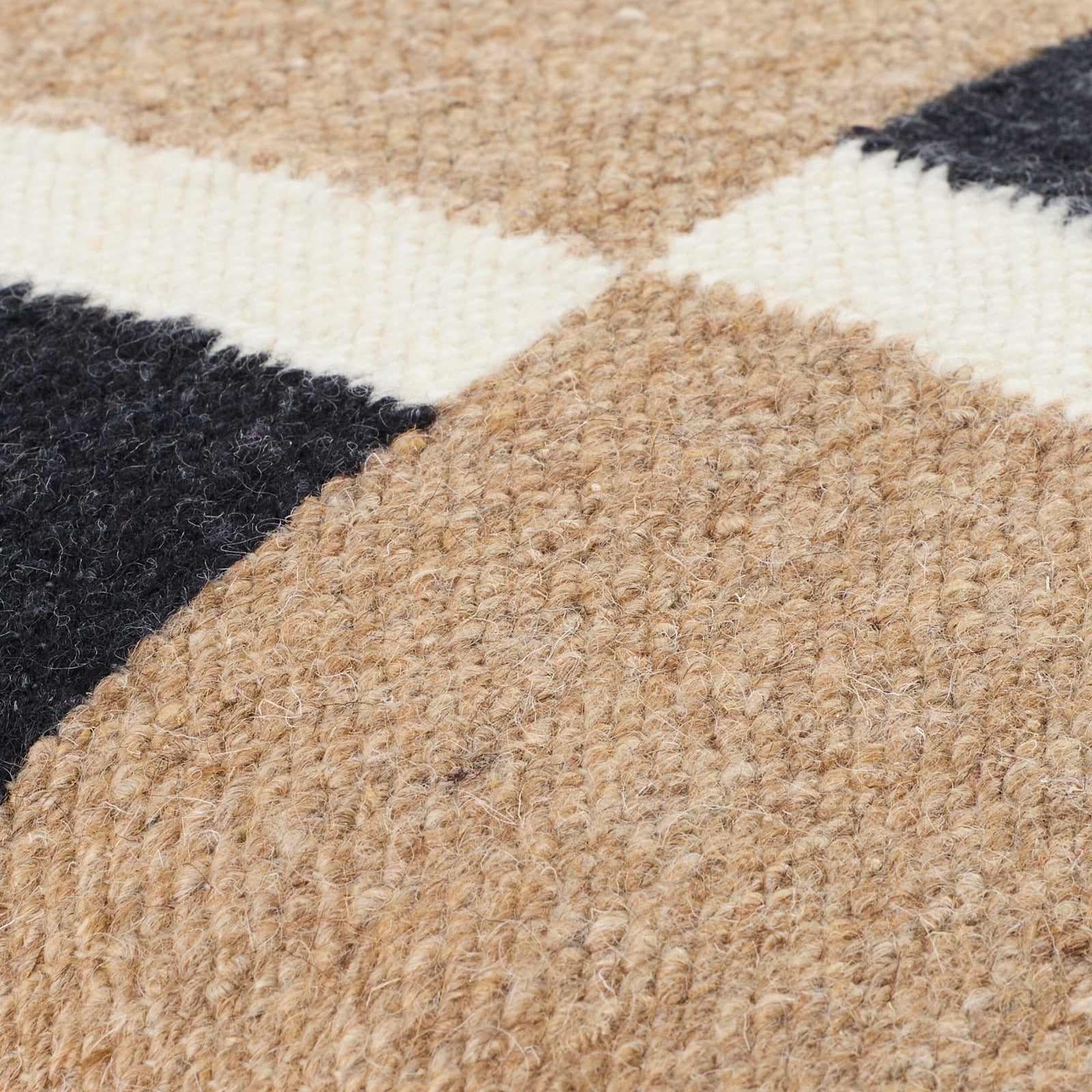 Osmund Woven Cushion in Black by Keiichi