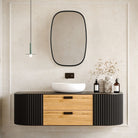 Jackson Oval Mirror in Black by Keiichi
