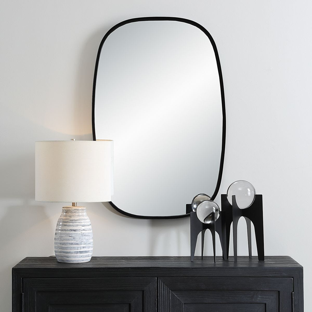Jackson Oval Mirror in Black by Keiichi