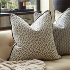 Wildcat Storm & Black Piping Cushion by Decorum Interiors