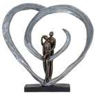 Love Sculpture In Circular Heart by Libra Interiors