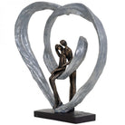 Love Sculpture In Circular Heart by Libra Interiors