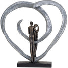 Love Sculpture In Circular Heart by Libra Interiors