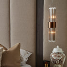 Colmar Single Pendant Light in Antique Brass. RV Astley.