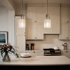 Kitner Natural Brass Single Glass Pendant Light by Quintiesse