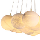 Chandelier Sphinx L antique brass finish alabaster by Eichholtz