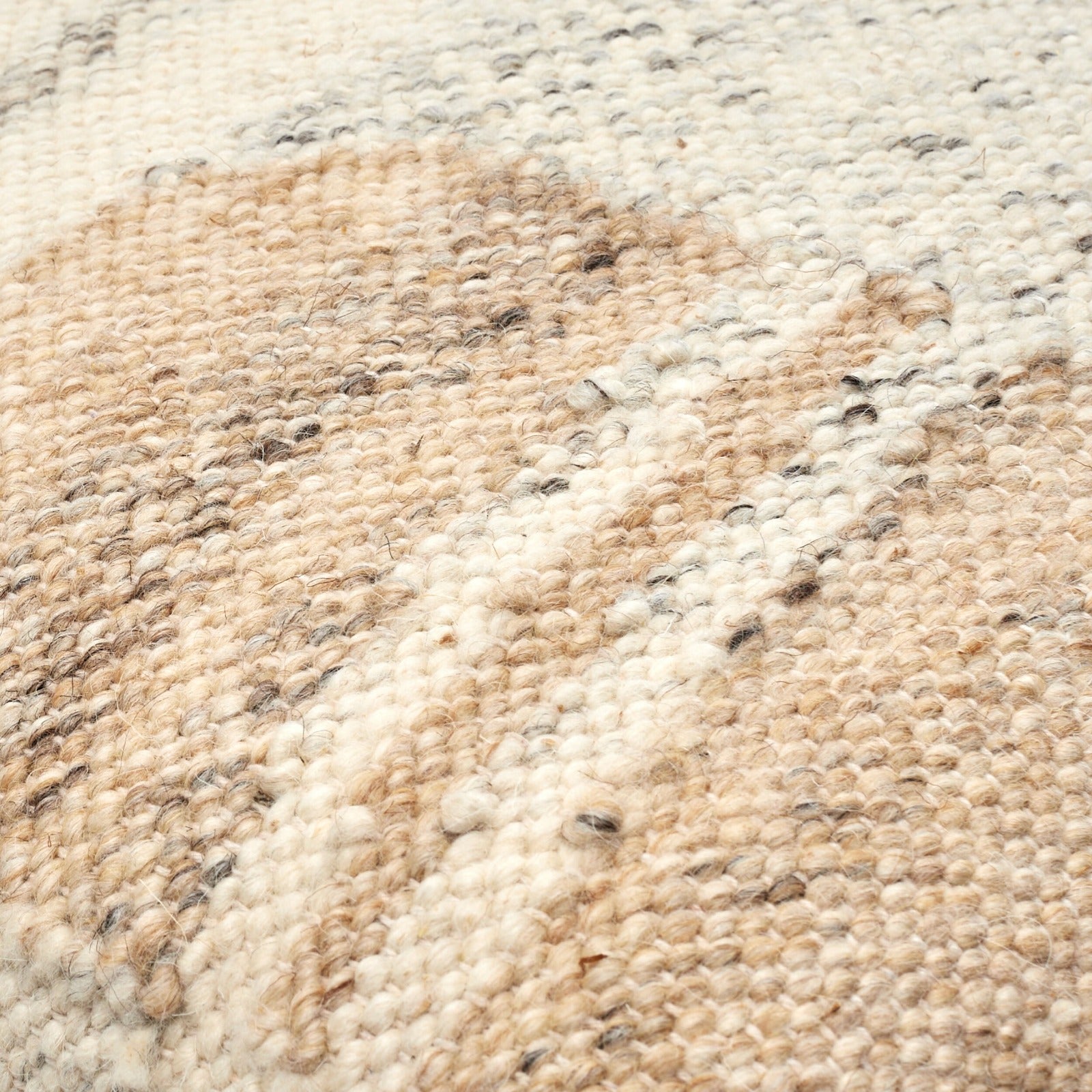 Deccan Traps Woven Wave Cushion in Light Beige by Keiichi