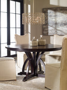 Maiva Round Black Dining Table by Uttermost