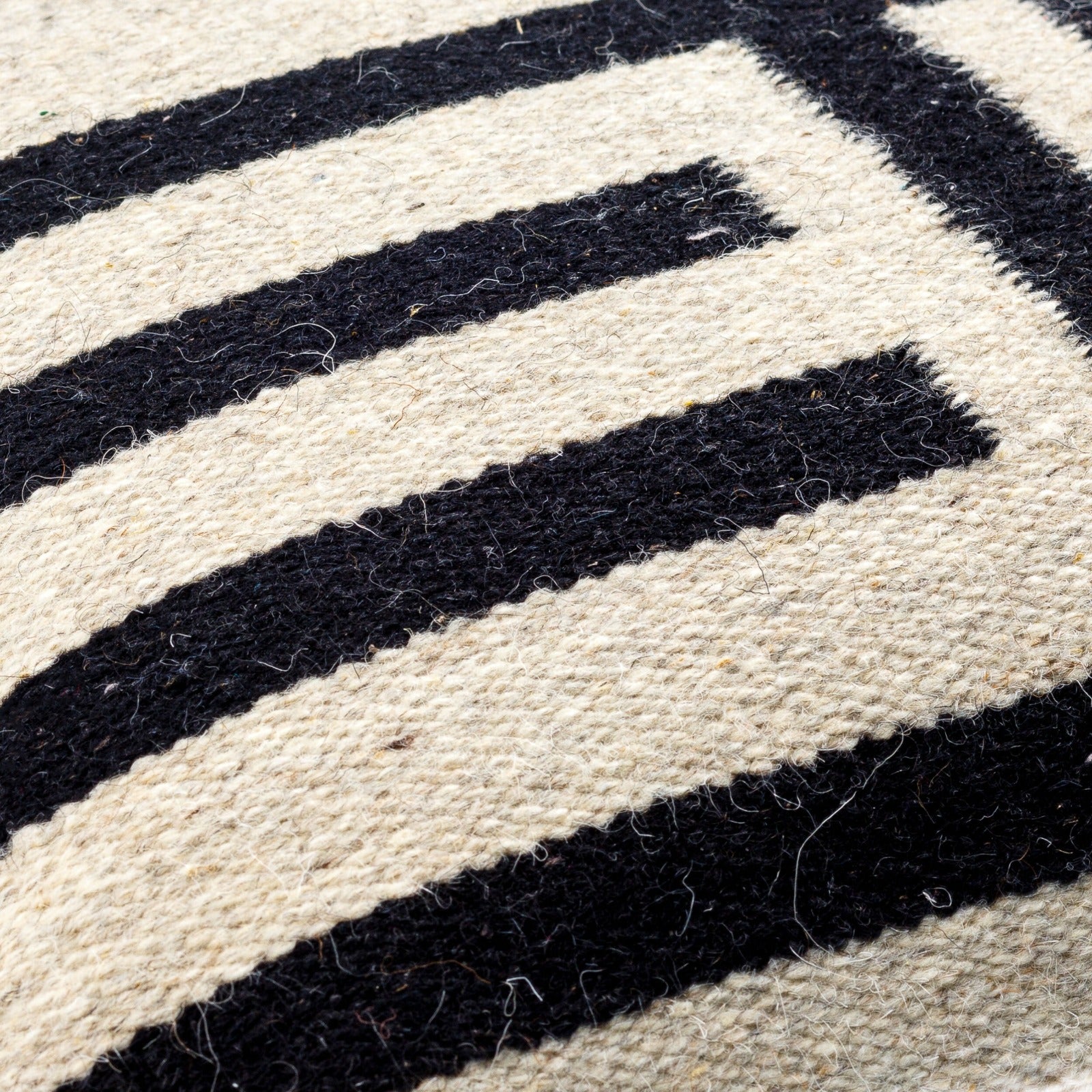 Garold Woven Cushion by Keiichi
