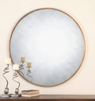 Junius Round Gold Mirror by Uttermost