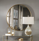 Junius Round Gold Mirror by Uttermost