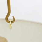 Franklin Antique Brass Wall Light with White Linen Shade by Arteriors