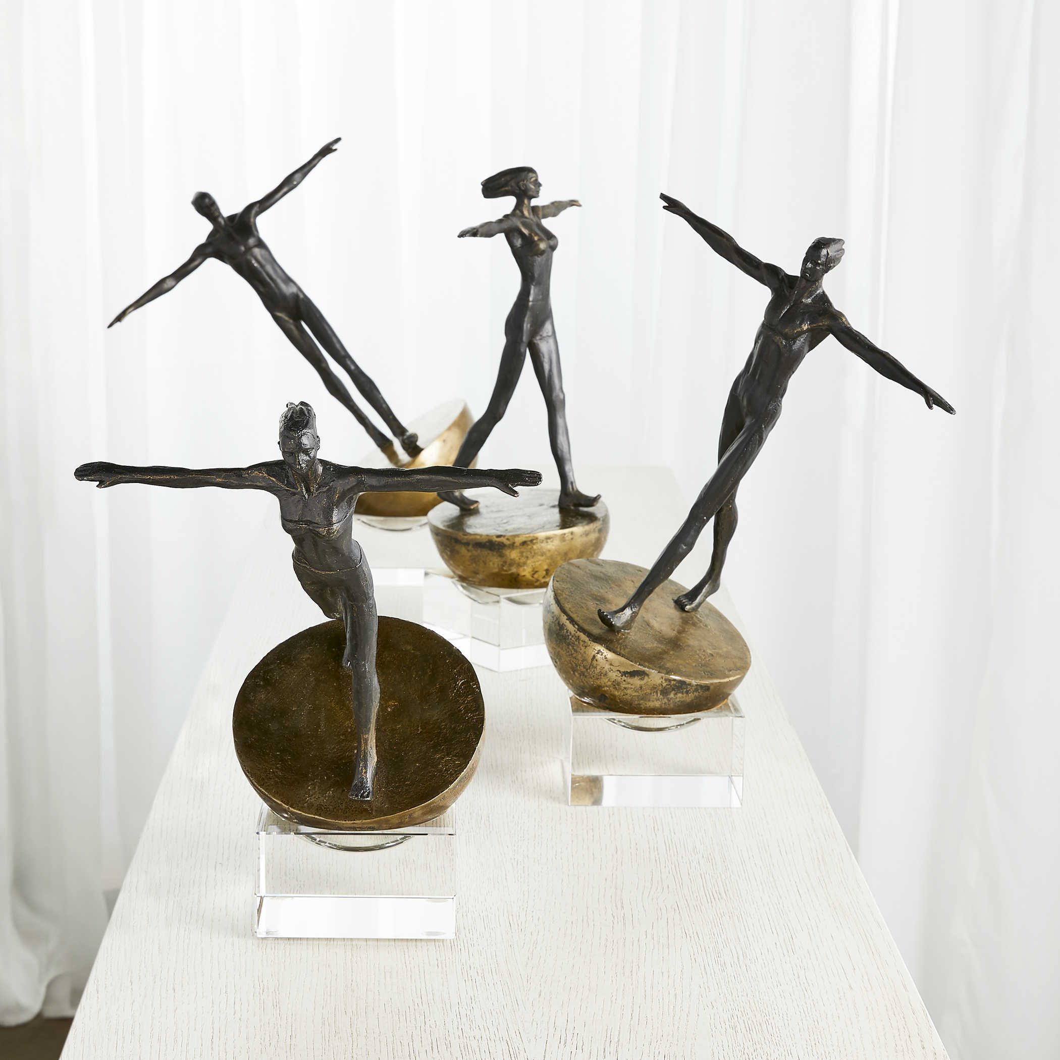 Woman Finding Balance Sculpture by Uttermost