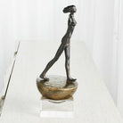 Woman Finding Balance Sculpture by Uttermost