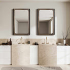 Fischer Curved Edge Gold Bronze Mirror by Uttermost
