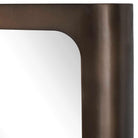 Fischer Curved Edge Gold Bronze Mirror by Uttermost