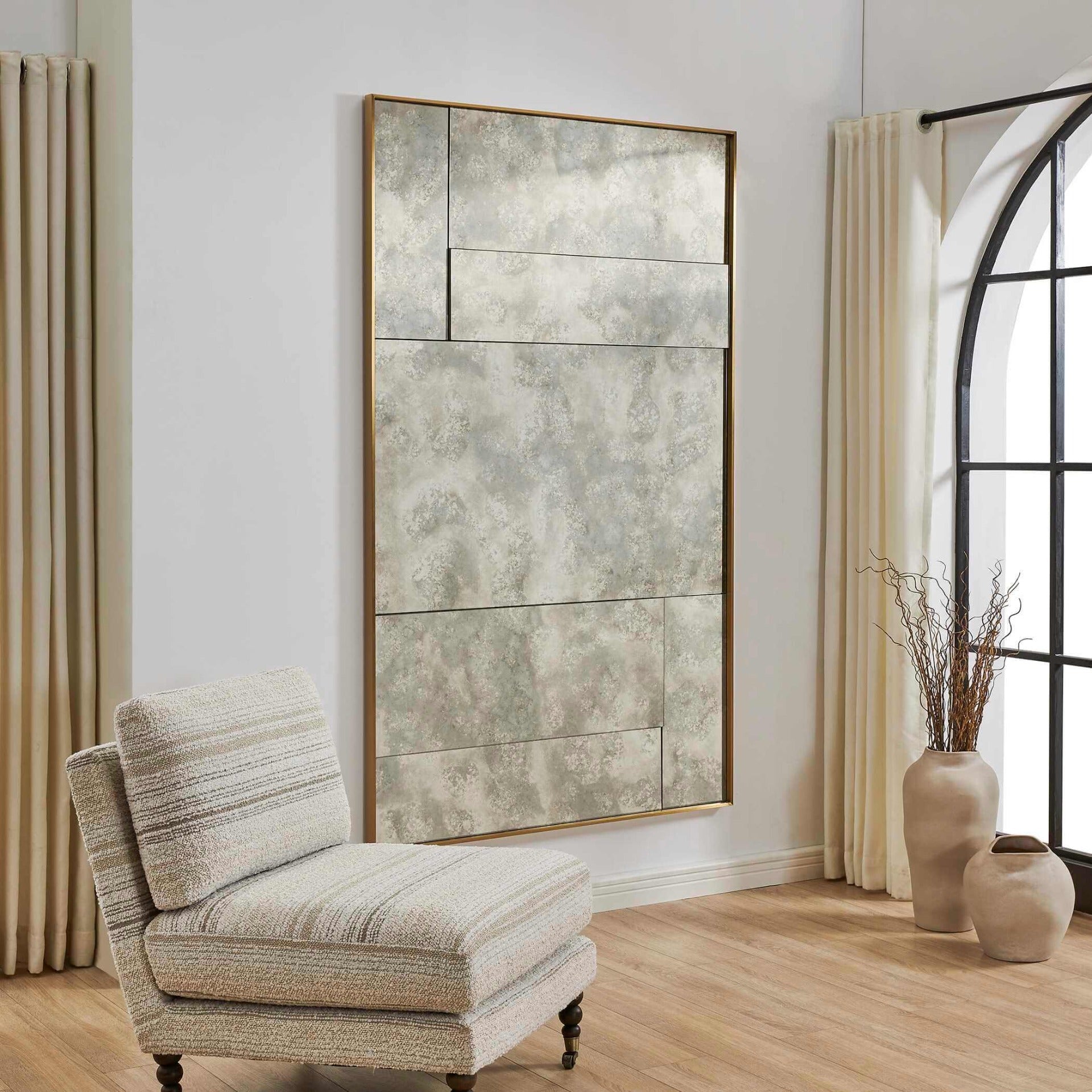 Rally Oversized Antiqued Mirror by Uttermost